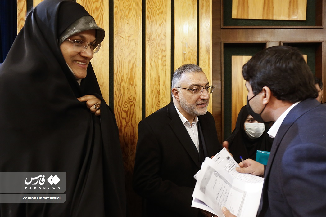 Lawmaker Zohreh Elahian (left) and Tehran Mayor Alireza Zakani (center)