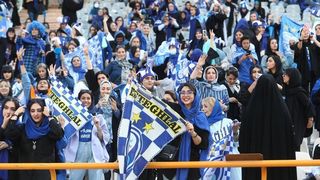 Iranian hardliners still oppose women at football matches