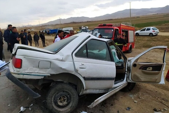 Half a vehicle remains at a crash scene in Iran, location unknown