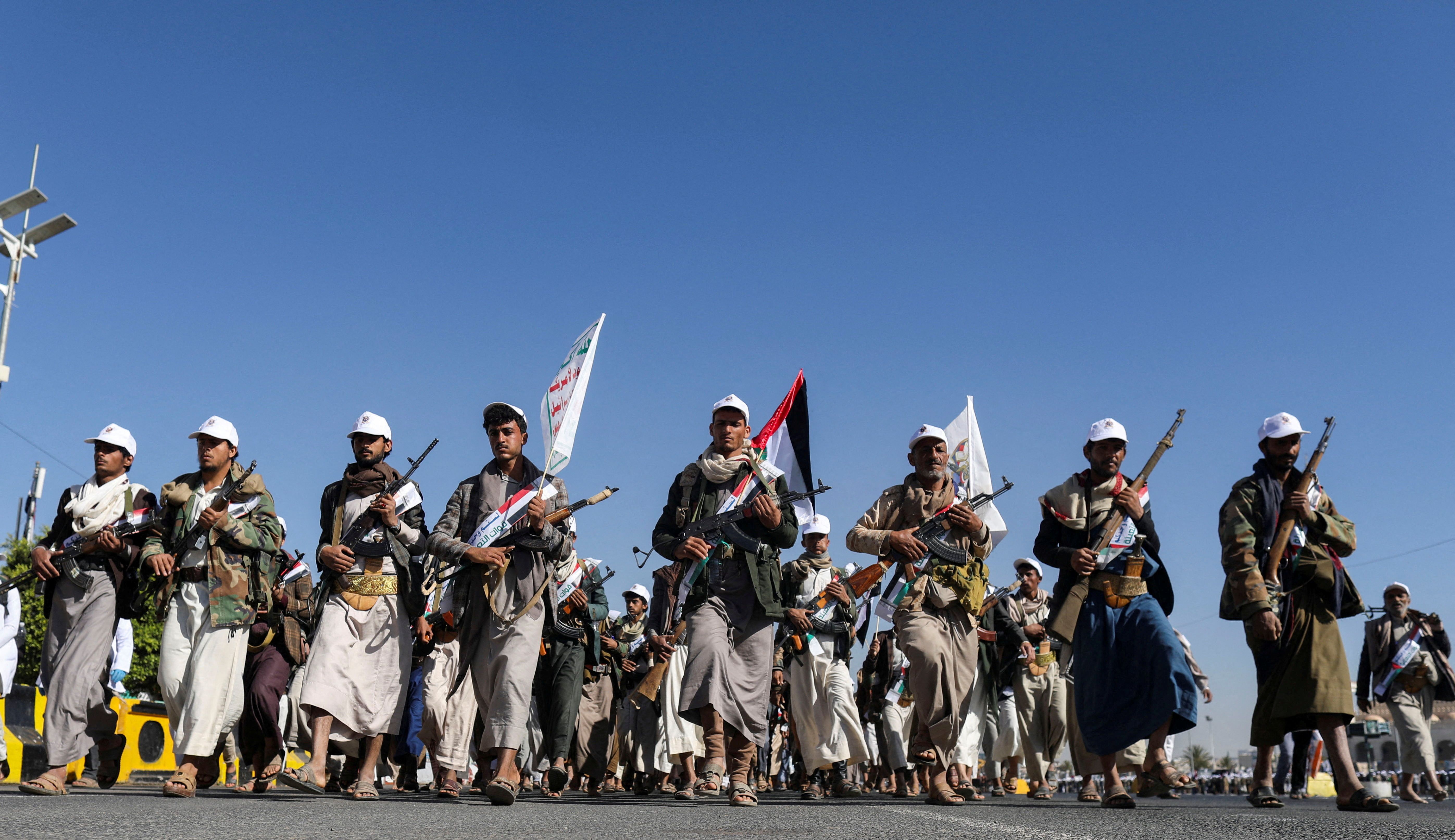 Newly recruited fighters who joined a Houthi military force intended to be sent to fight in support of the Palestinians in the Gaza Strip, march during a parade in Sanaa, Yemen December 2, 2023. 