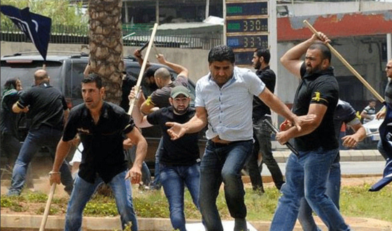 2013 protest where Hussain El Hajj Hassan said he was attacked by Hezbollah. His friend, the leader of the protest, was killed.