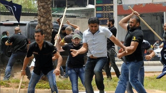 2013 protest where Hussain El Hajj Hassan said he was attacked by Hezbollah. His friend, the leader of the protest, was killed.