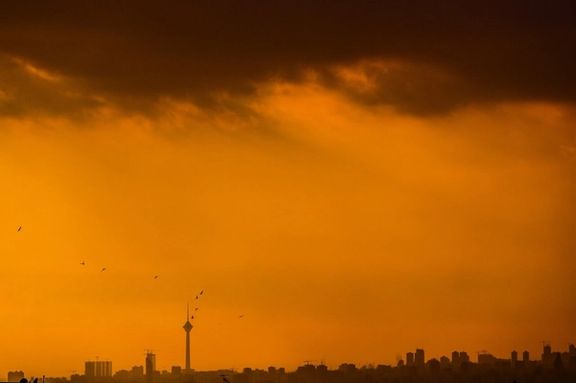 Tehran skyline at sunset, with the city's iconic Milad Tower rising in the distance, January 2026