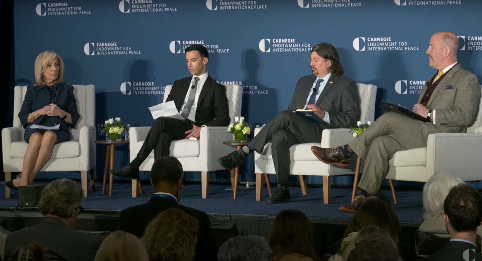 Host Andrea Mitchell with panel guests