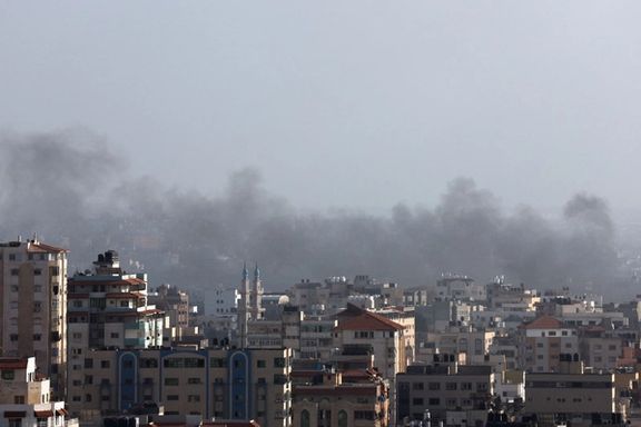 Smoke billows following Israeli strikes launched into Gaza on May 13, 2023.