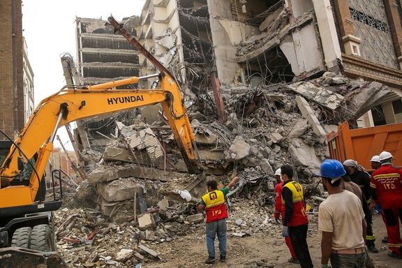 Rescue operation in Abadan where dozens remained under the debris of a collapsed building