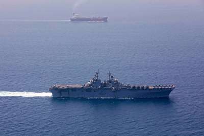 US imposes new Iran sanctions as officials say Hormuz deal is near