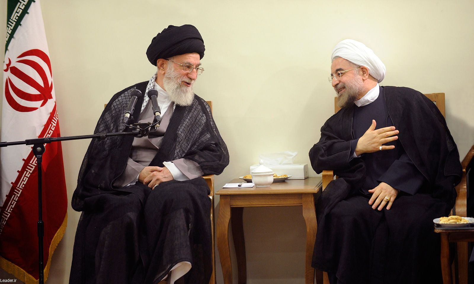 Iran’s Supreme Leader Ali Khamenei (left) and former president Hassan Rouhani  