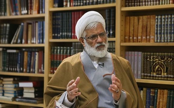 Leading cleric Mohammad Reza Nourollahi speaking with Aftab news in July 2022