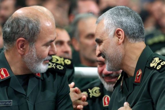 Iran's new Secretary of the Supreme National Security Council Ali Akbar Ahmadian is seen next to the late Iranian Major-General Qasem Soleimani during a meeting in Tehran, Iran, in this undated picture obtained on May 22, 2023.