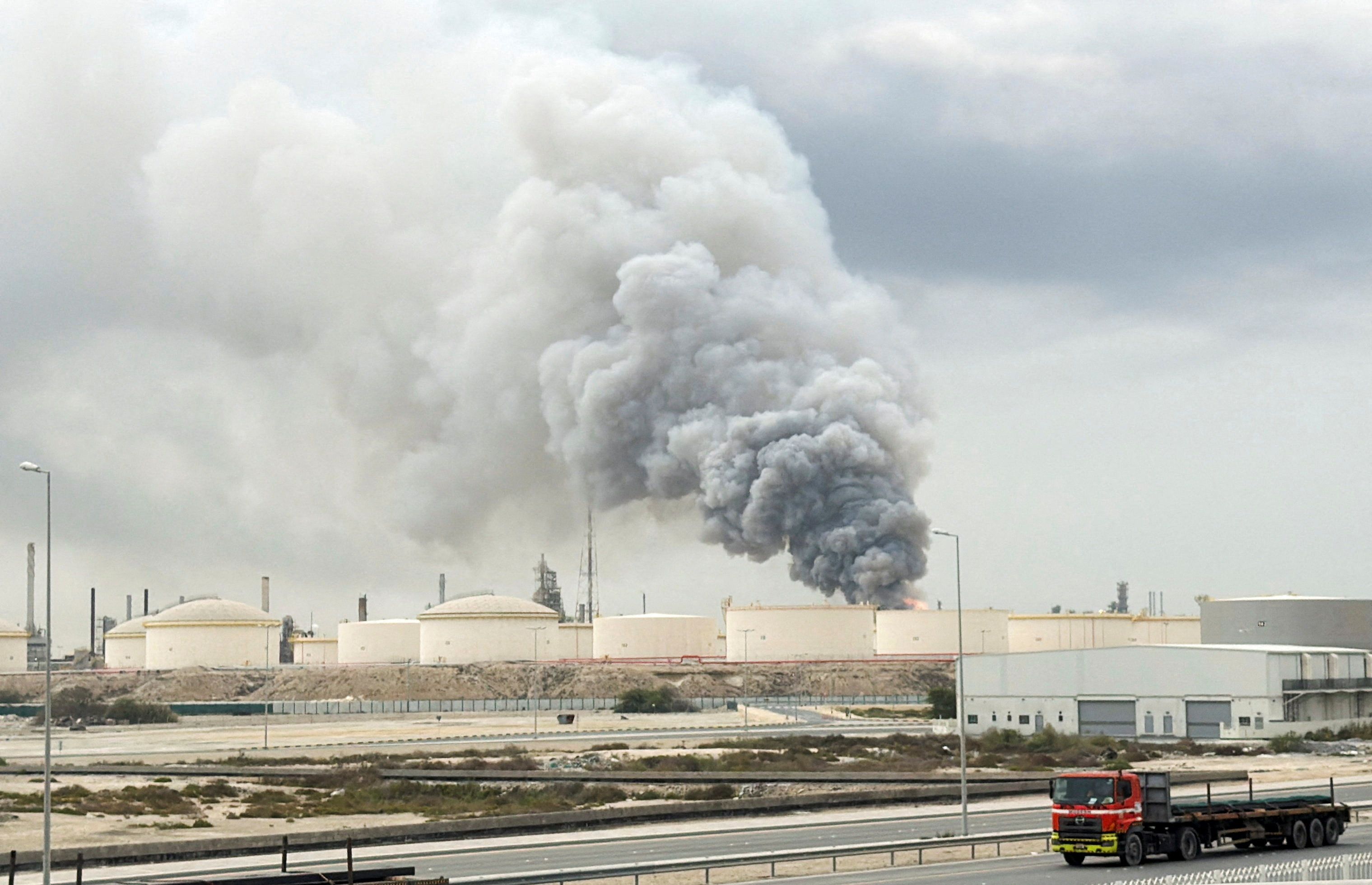 Smoke rises following a strike on the Bapco Oil Refinery, amid the US-Israeli conflict with Iran, on Sitra Island Bahrain, March 9, 2026. 