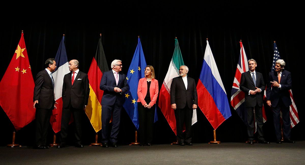 Officials announcing Iran nuclear agreement in Vienna in July 2015. (From left to right) Foreign ministers/secretaries of state Wang Yi (China), Laurent Fabius (France), Frank-Walter Steinmeier (Germany), Federica Mogherini (EU), Mohammad Javad Zarif (Iran), Philip Hammond (UK), John Kerry (USA)  