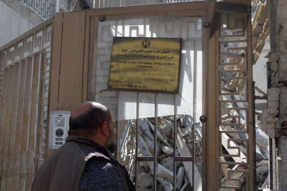 A man stands near the rubble, after an Israeli strike on Iran's consulate, adjacent to the main Iranian embassy building, in the Syrian capital Damascus, Syria April 2, 2024.