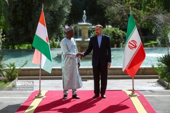 Iranian Foreign Minister Hossein Amir-Abdollahian (right) and his Nigerien counterpart Ibrahim Yacoubou in Tehran on October 24, 2023