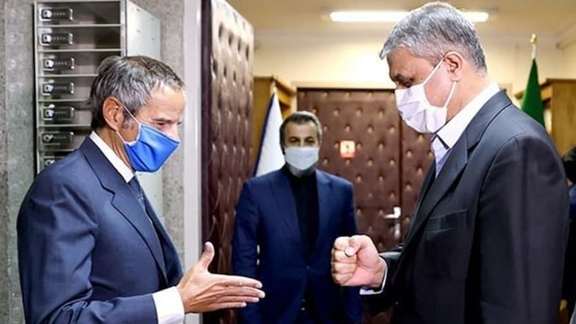 Rafael Grossi (L) meeting with the Iranian nuclear cheif Mohammad Eslami on March 5, 2022