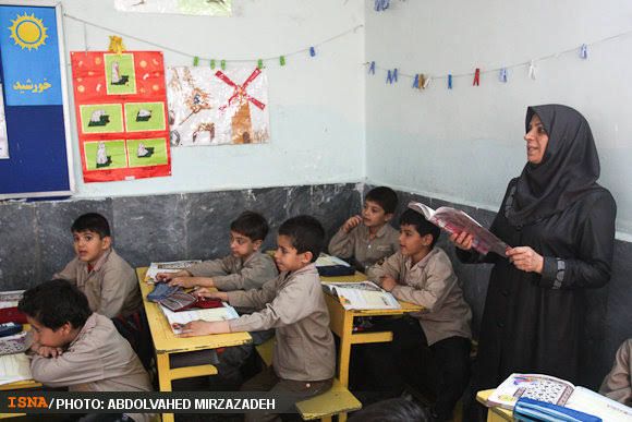 A teacher at a class in Iran 