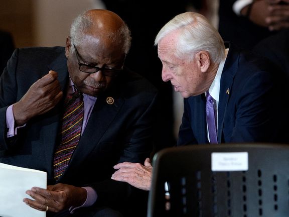 US House Majority Whip James Clyburn (L) speaks to House Majority Leader Steny Hoyer. March 29, 2022