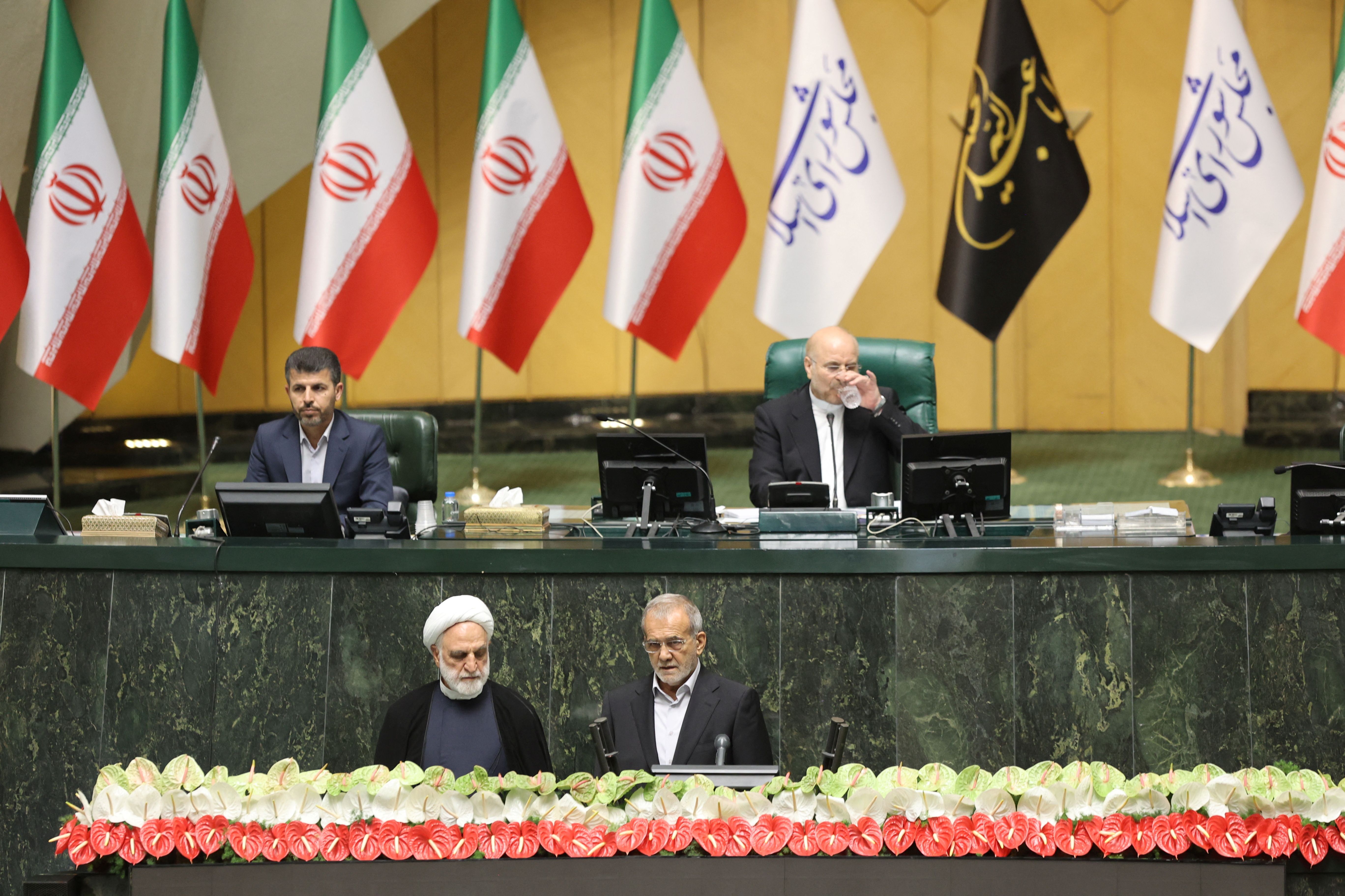 Iran's new president takes oath of office in presence of regional proxies