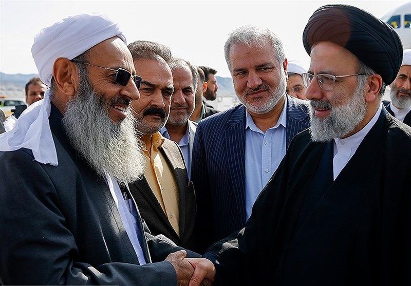 Abdolhamid (L) with President Raisi during the 2021 presidential election