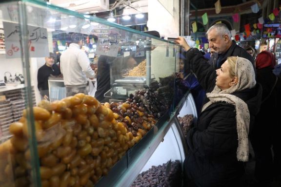 A woman shops during the holy month of Ramadan in Tehran, Iran, March 11, 2024.