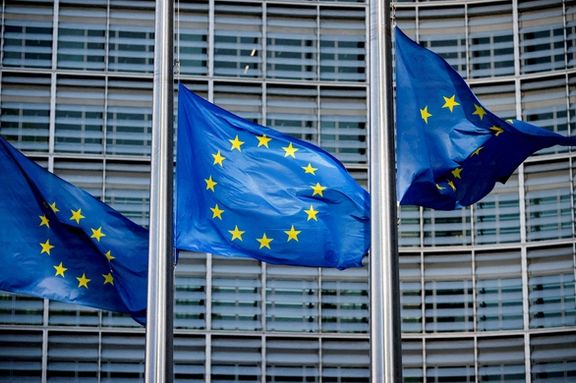 European Union flags fly outside the European Commission headquarters in Brussels, Belgium.