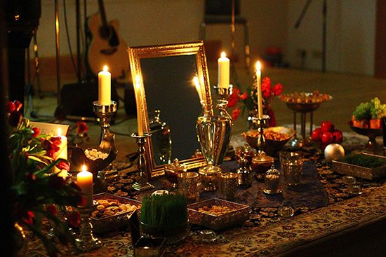 Tradition table arrangement during Noruz, displaying symbols of food and life.