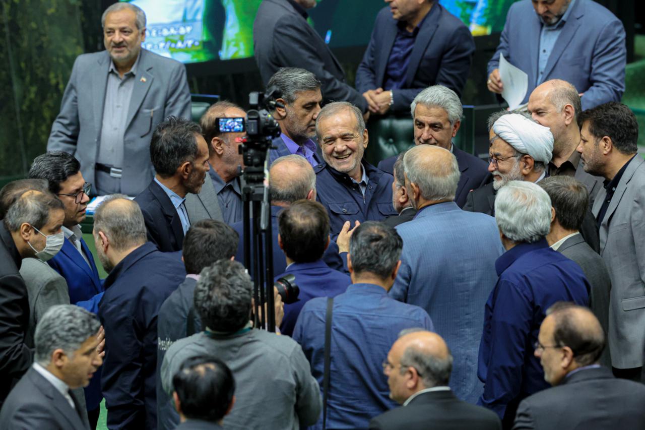 President Masoud Pezeshkian among lawmakers at the parliament on November 11, 2025 