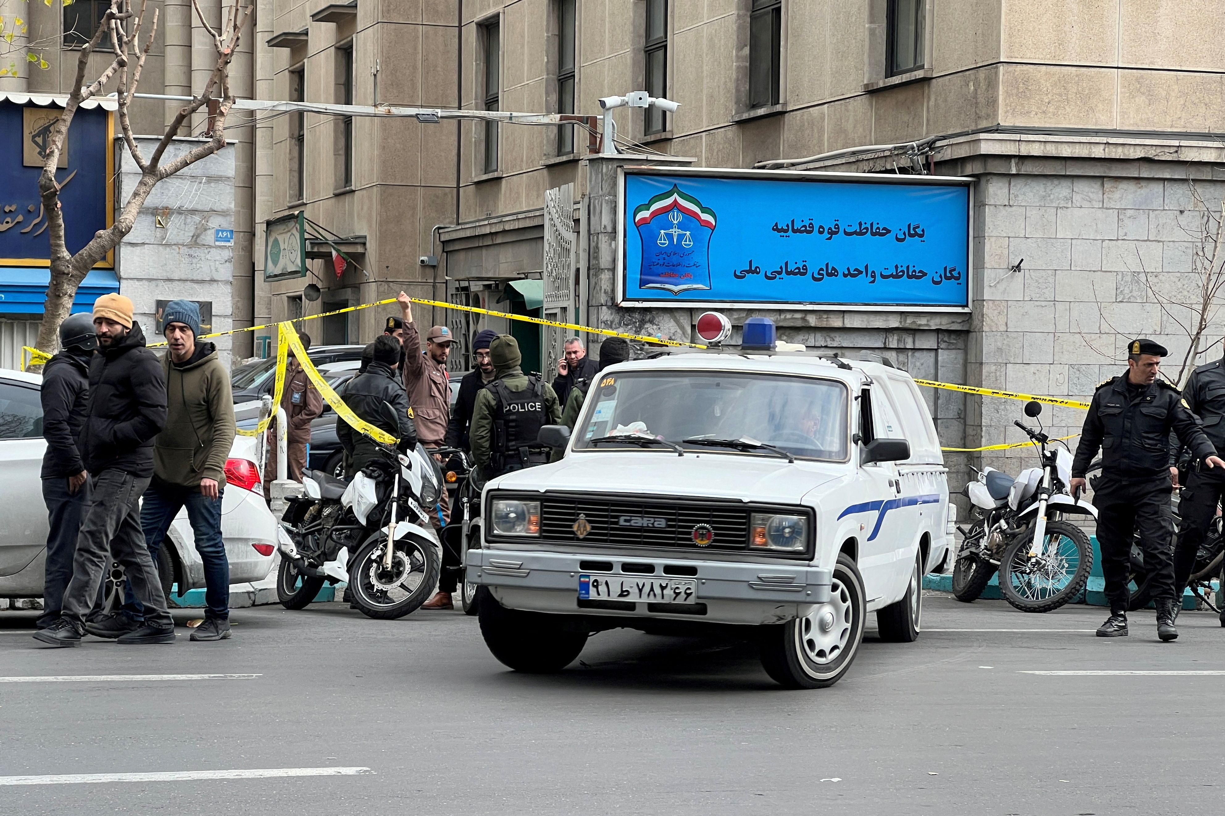 Members of the police stand in front of the judiciary building after the assassination of the Supreme Court Judges Mohammad Moghiseh and Ali Razini in Tehran, Iran, January 18, 2025. 