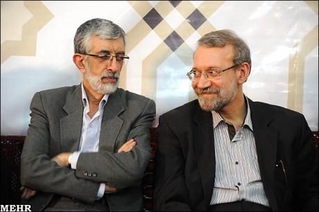 Former Iranian parliament speakers Gholam Ali Haddad Adel (left) and Ali Larijani