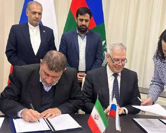 Iranian and Russian officials signing agreements on February 10, 2024