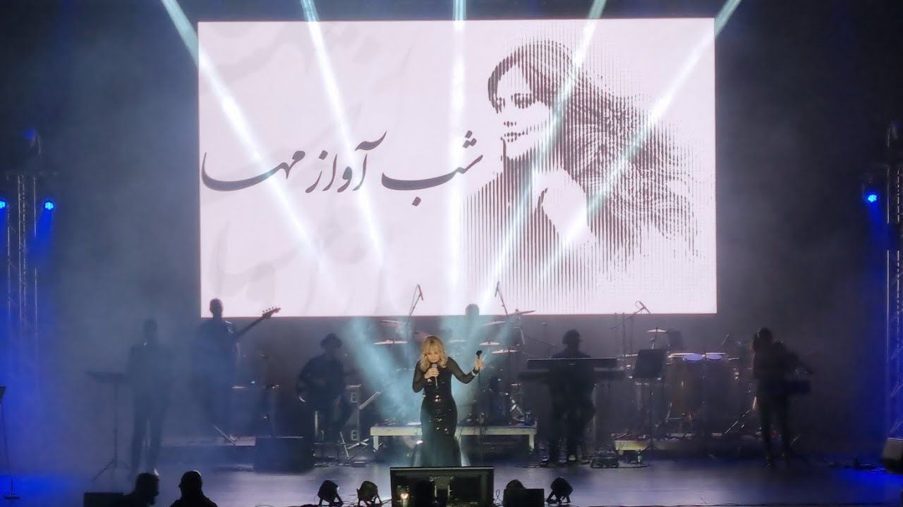 Iranian superstar Googoosh during a concert featuring a videoart of Mahsa Amini, whose death in police custody sparked Women, Life, Freedom protests in 2022 