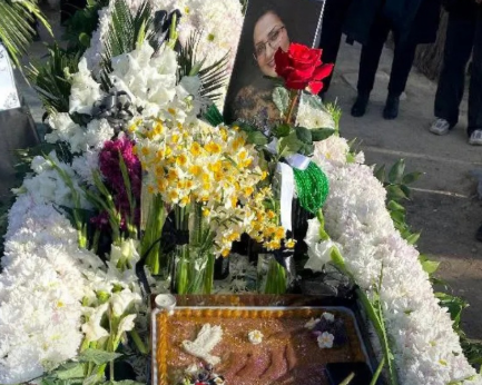 The grave of Arezoo Abedi during a memorial marking the fortieth day after her death