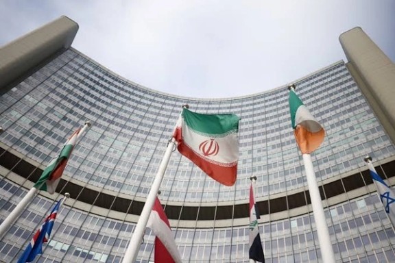 The Iranian flag waves in front of the International Atomic Energy Agency (IAEA) headquarters in Vienna, Austria, March 1, 2021.