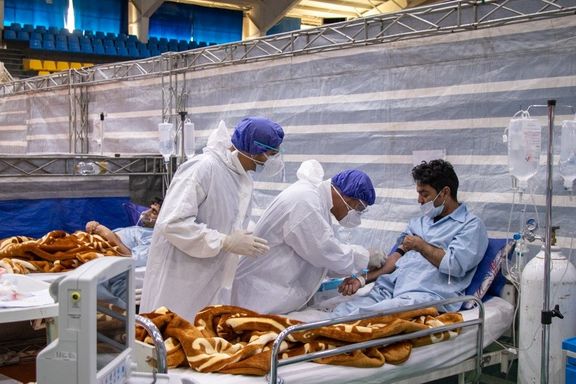 A Covid-19 patient in a Tehran hospital in April.