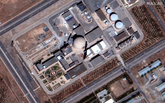 Satellite imagery by Maxar Technologies shows the Arak reactor building's domed roof before the Israeli attack