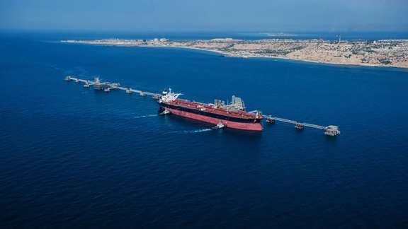 An oil tanker loading Iranian crude in southern Iran