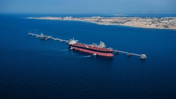 An oil tanker loading Iranian crude in southern Iran