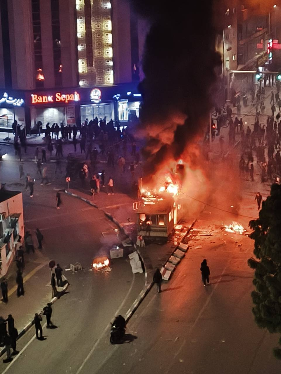 Millions of Iranians take to the streets as protest death toll hits 42