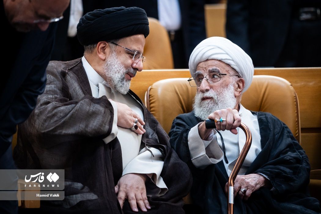 Ayatollah Ahmad Jannati (right) and President Ebrahim Raisi during an event in Tehran in June 2023 