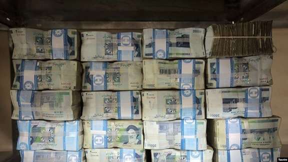 Stacks of Iranian currency that has lost most of its value since 2017.