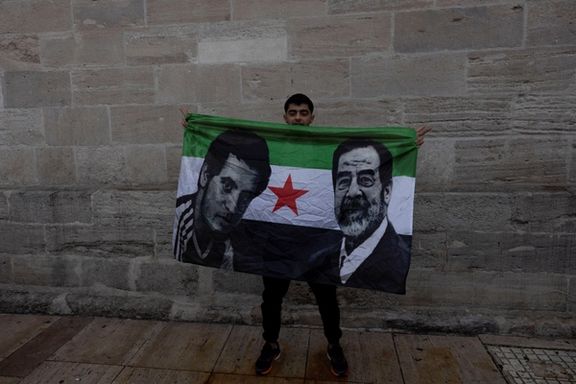 A Syrian living in Turkey celebrates with a flag after Syrian rebels announced that they have ousted President Bashar al-Assad, in front of the Fatih Mosque in Istanbul, Turkey, December 8, 2024.