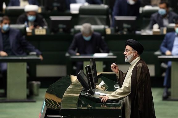 President Raisi addressing the parliament in 2022