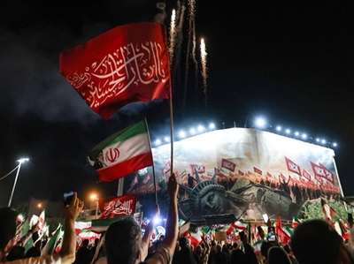 Iran shrugs off US economic war as analysts sound alarm