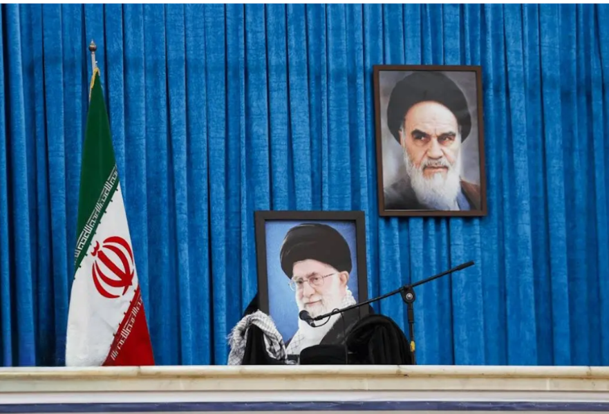 An empty seat and a portrait of Iran's slain Supreme Leader Ali Khamenei are seen at a venue in Tehran