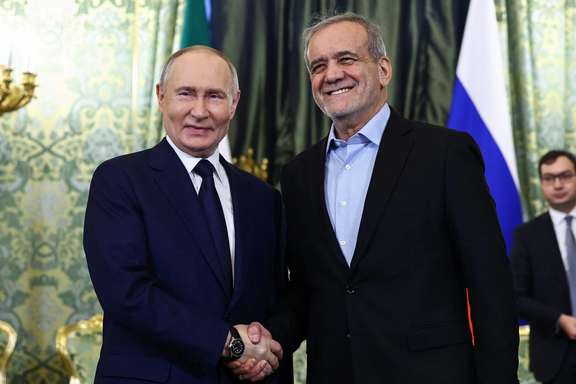 Russian President Vladimir Putin and Iranian President Masoud Pezeshkian shake hands as they meet in Moscow, Russia January 17, 2025.