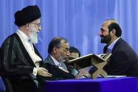 Iran’s ruler Ali Khamenei and Quran reciter Saeed Tooai