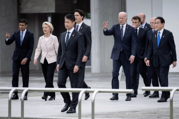 Britain's Prime Minister Rishi Sunak, European Commission's President Ursula von der Leyen, Canada's Prime Minister Justin Trudeau, US President Joe Biden, France's President Emmanuel Macron, European Council's President Charles Michel, Germany's Chancellor Olaf Scholz and Japan's Prime Minister Fumio Kishida visit the Peace Memorial Park as part of the G7 Leaders' Summit in Hiroshima on May 19, 2023.