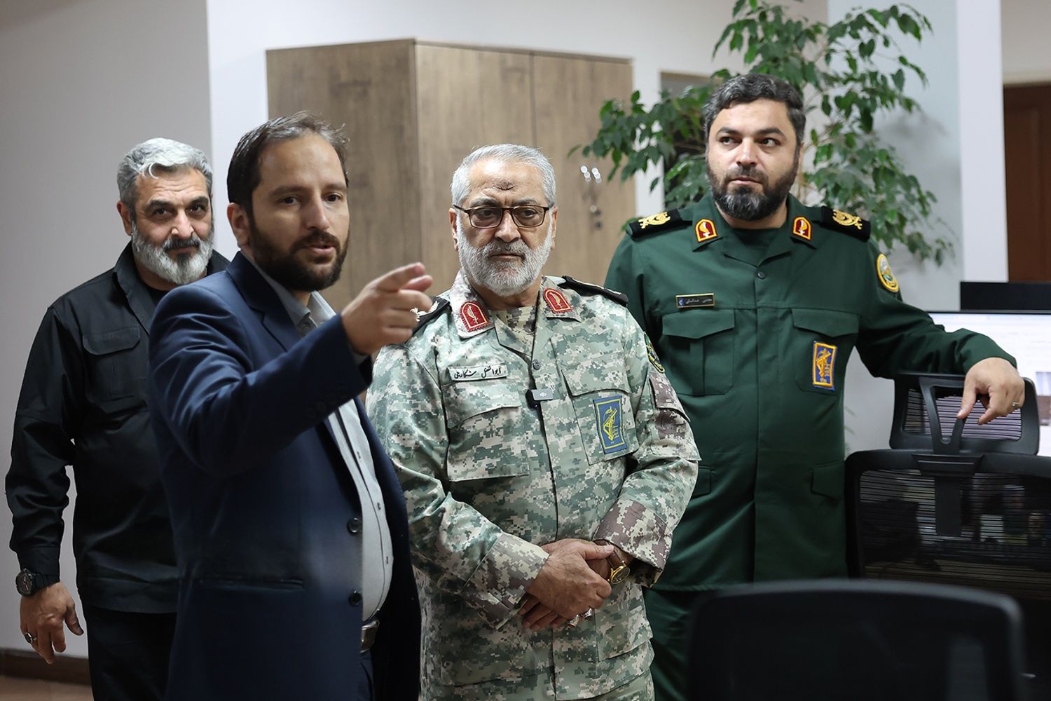 Abolfazl Shekarchi, spokesman for Iran’s armed forces, visits a news agency in Tehran.