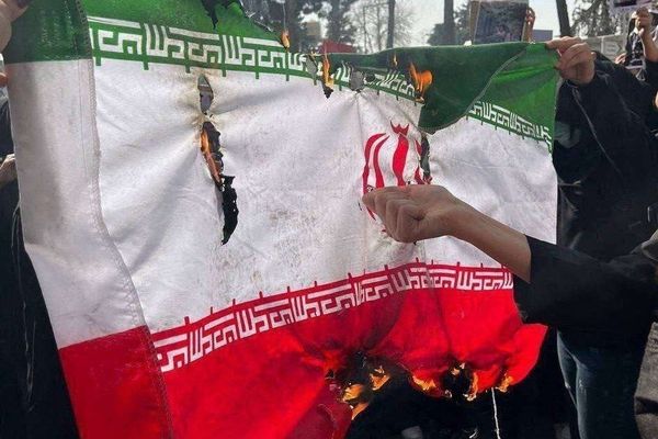Iranian students burn flag, signaling a new phase in state–society rupture