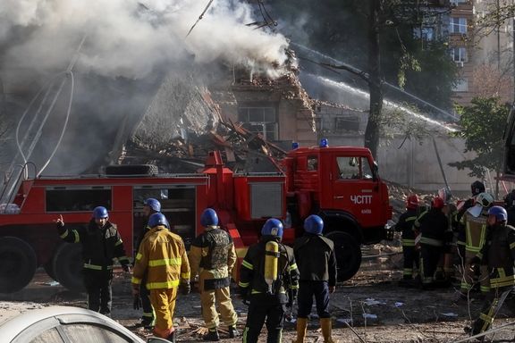 Ukranian emergency services deal with the aftermath of a Russian drone attack in Kyiv